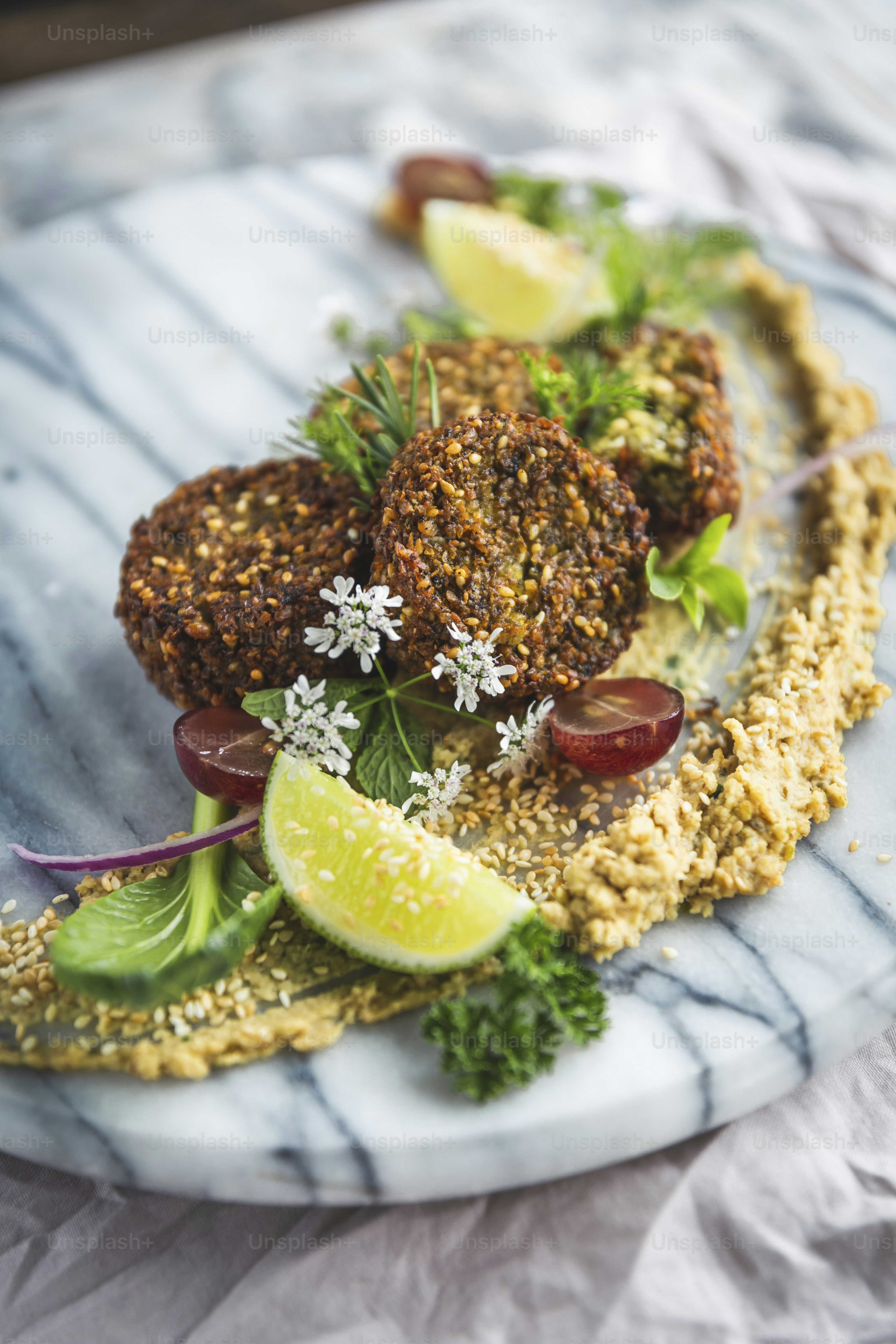 a white plate topped with food on top of a table
