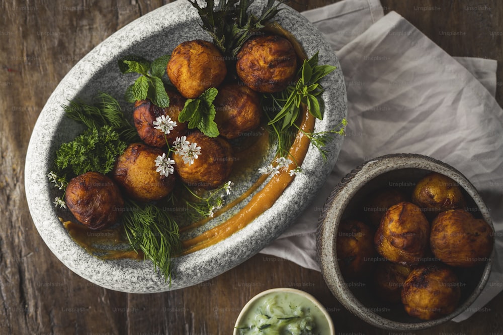 a platter of food on a wooden table