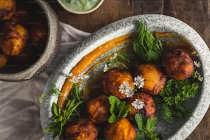 a bowl of food on a wooden table