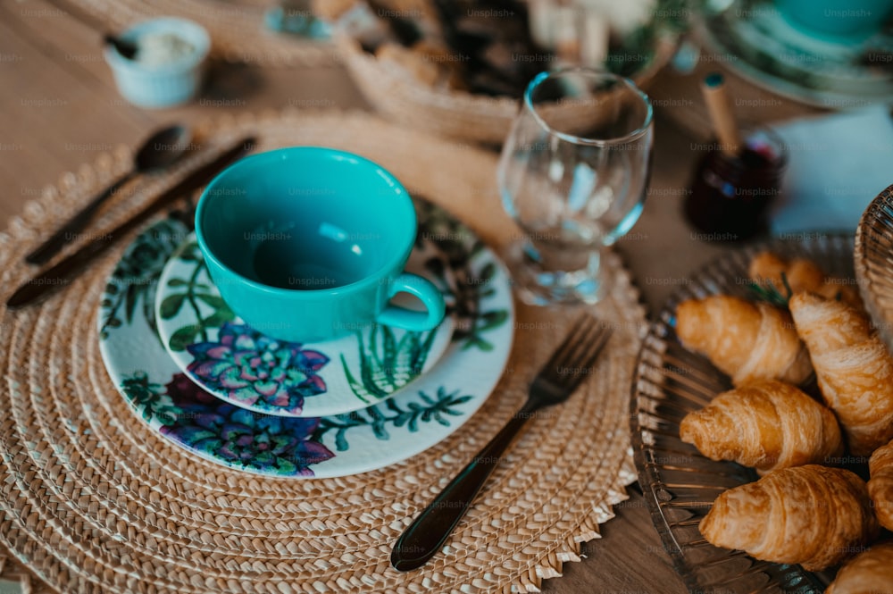 a close up of a plate with croissants on it