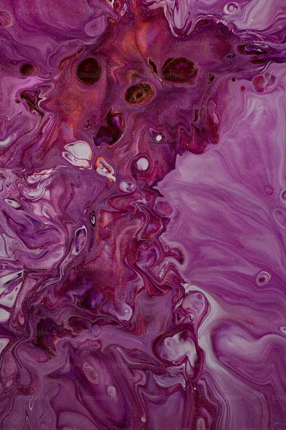 an abstract painting with purple and red colors
