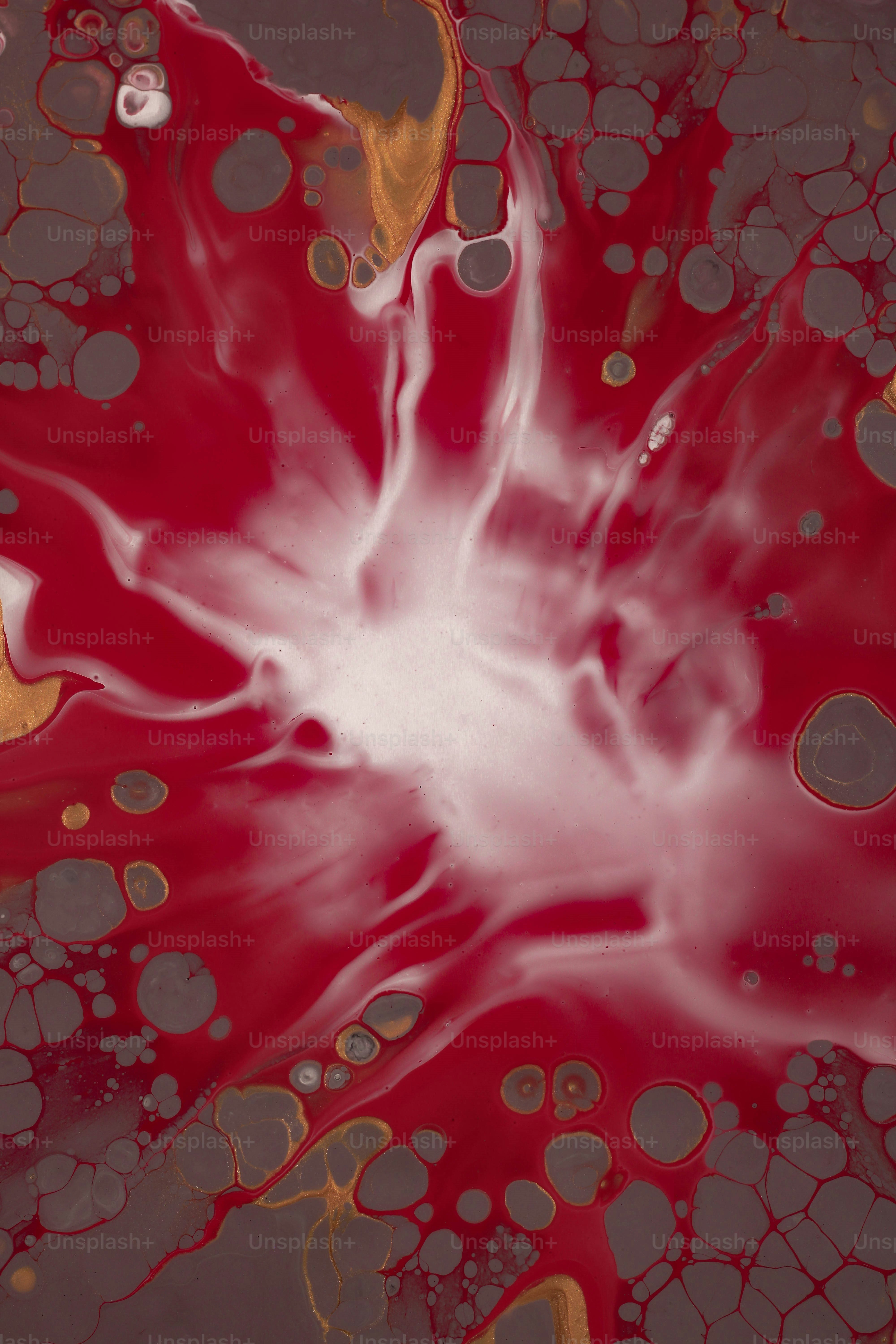 A close up of a red and yellow substance photo – Background Image on ...