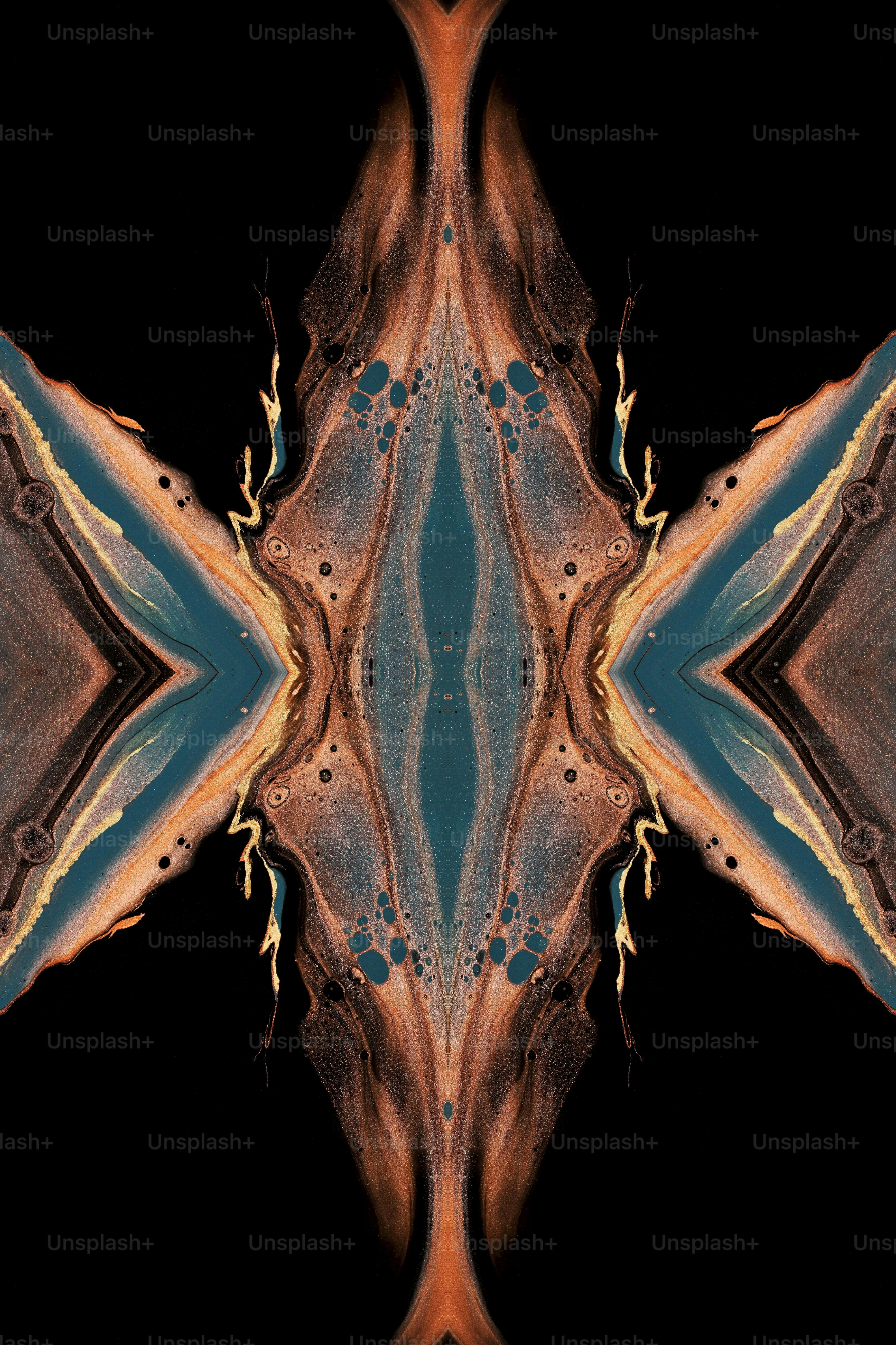 an abstract image of a butterfly with a black background