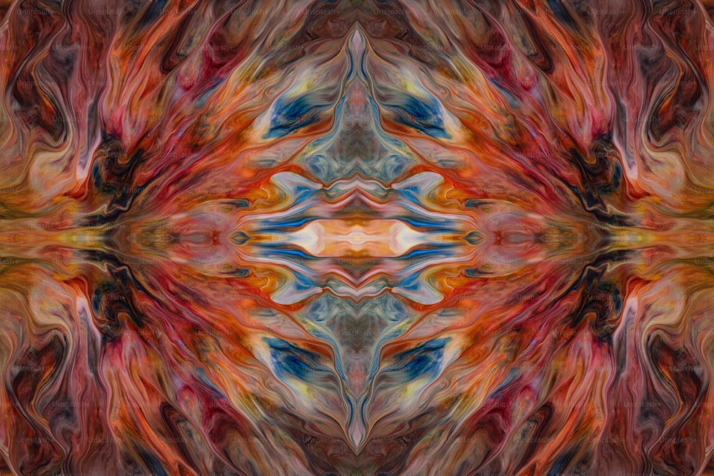 an abstract painting of an orange, red, and blue flower