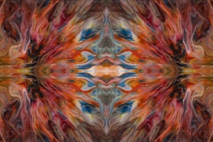 an abstract painting of an orange, red, and blue flower