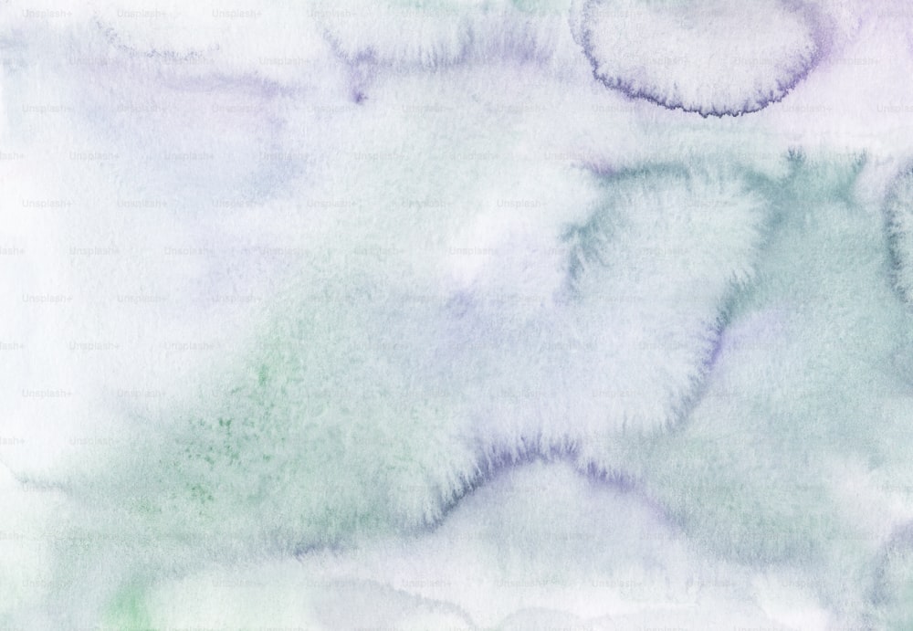 a watercolor painting of green and purple clouds