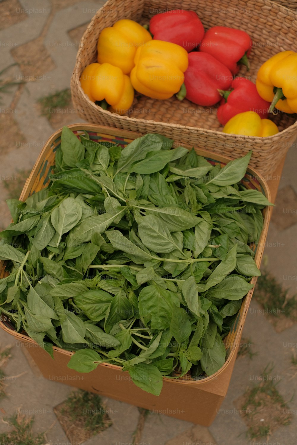 a couple of baskets filled with different types of vegetables