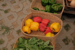 a couple of baskets filled with different types of vegetables