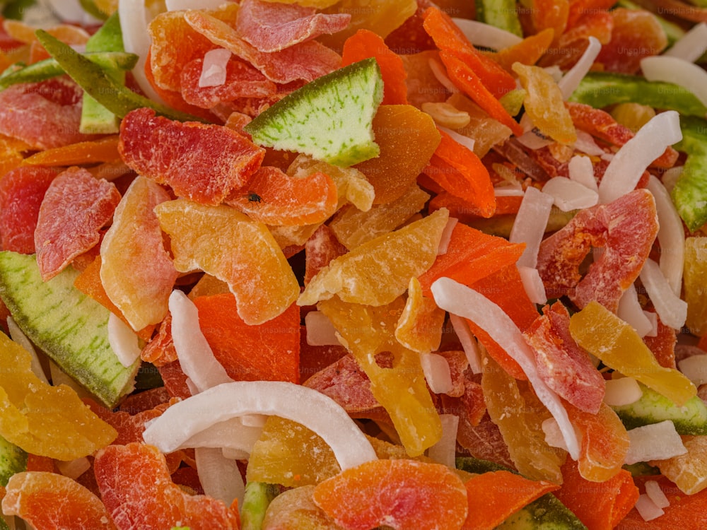 a close up of a pile of fruit salad