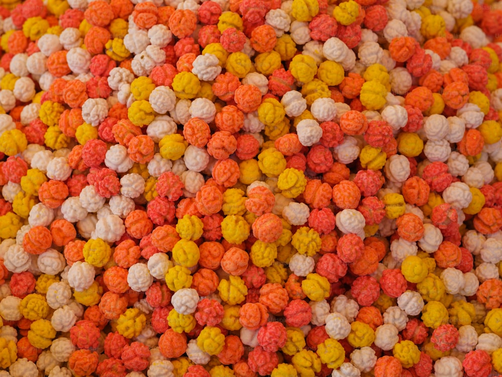 a close up of a bunch of different colored balls