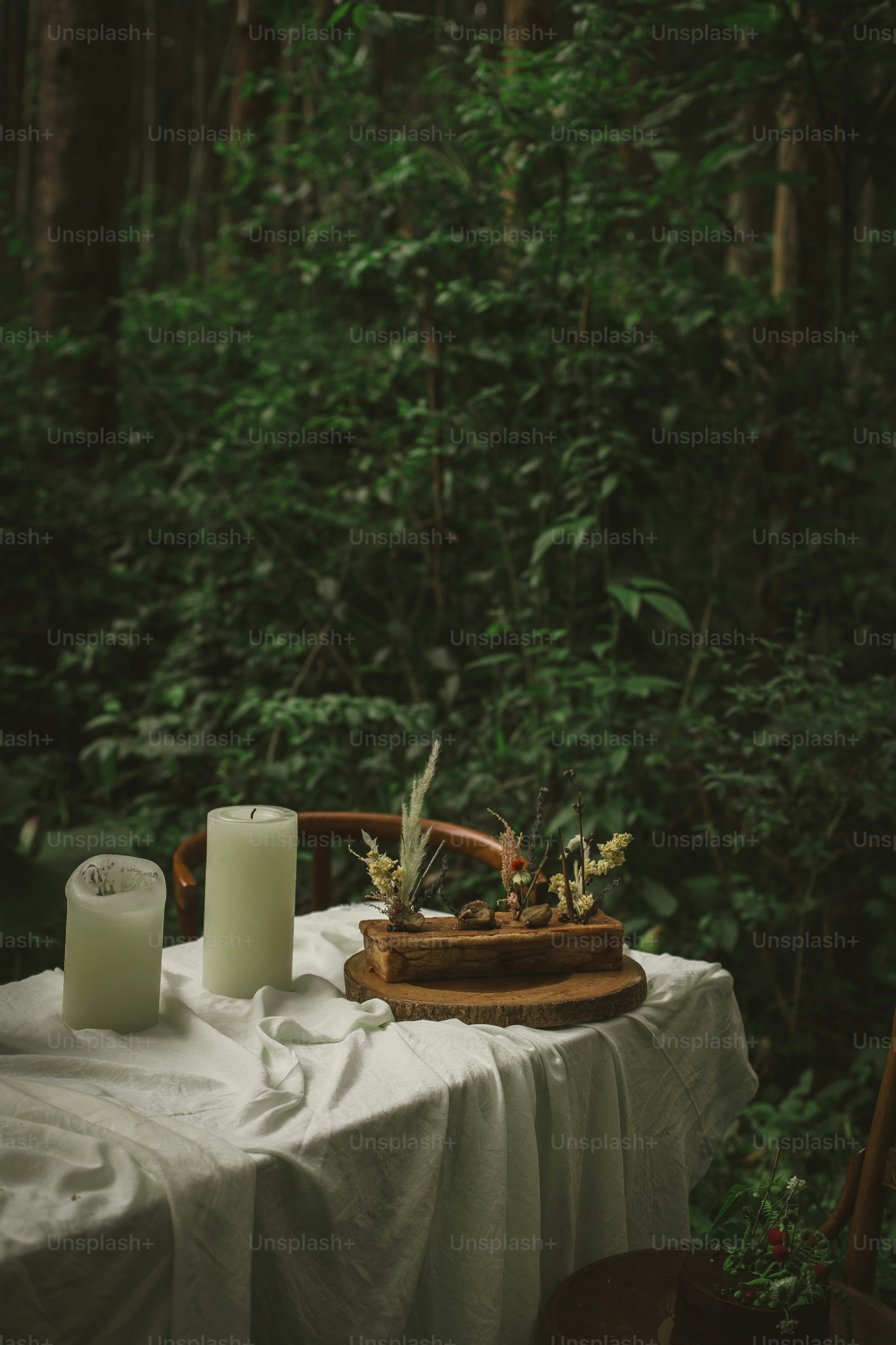 a table with candles and a basket on it