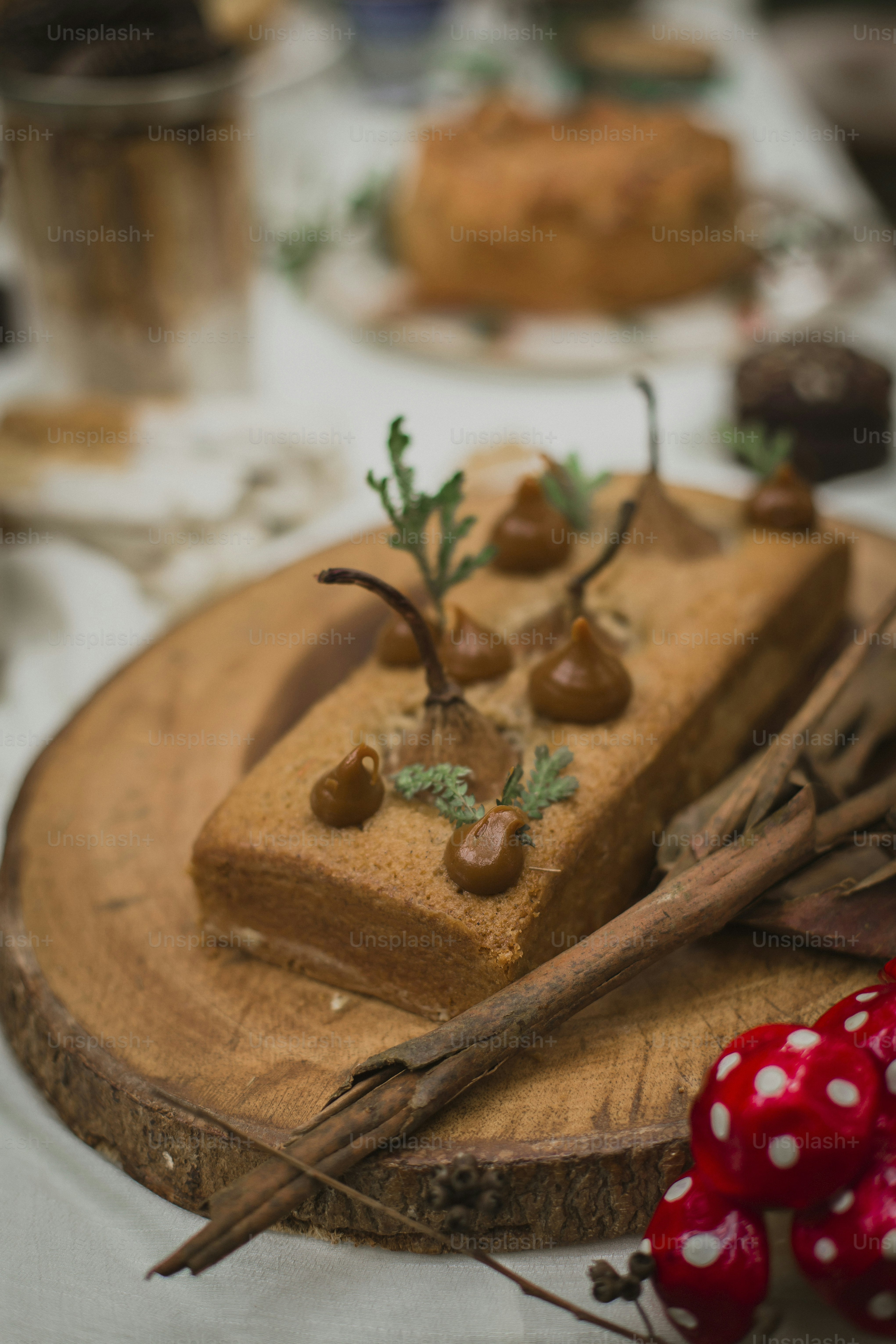 a piece of cake sitting on top of a wooden plate