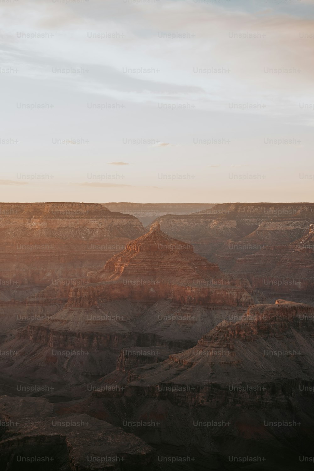 a view of the grand canyon at sunset