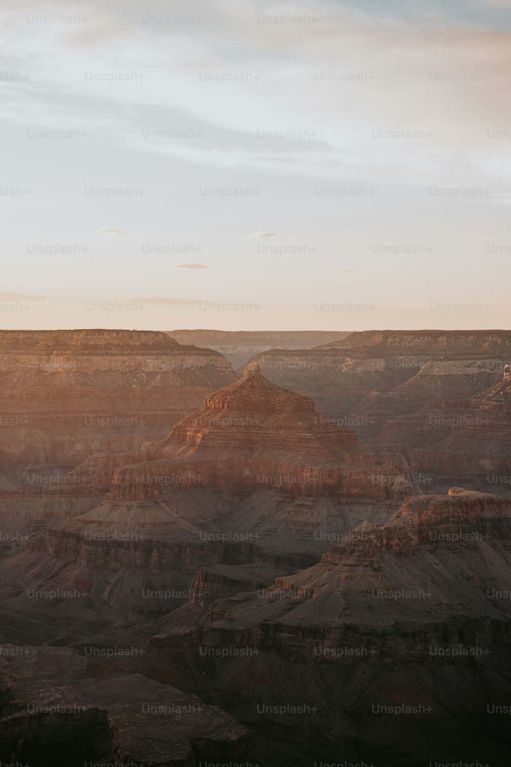 a view of the grand canyon at sunset