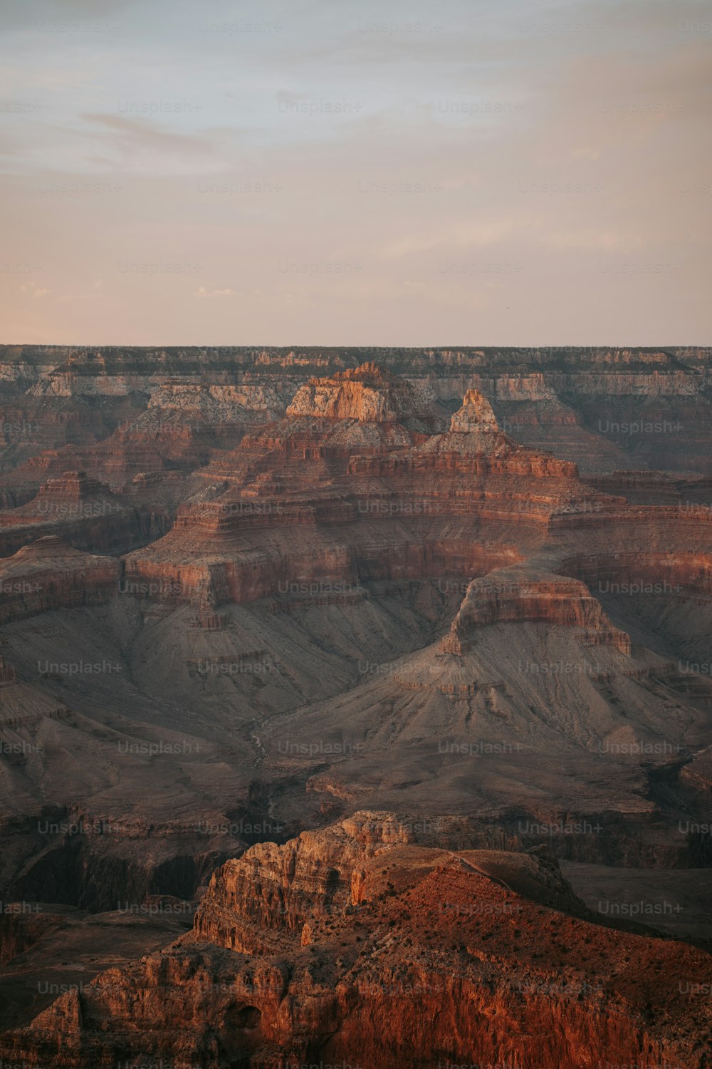 a view of the grand canyon at sunset