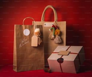 a brown paper bag and a brown gift bag