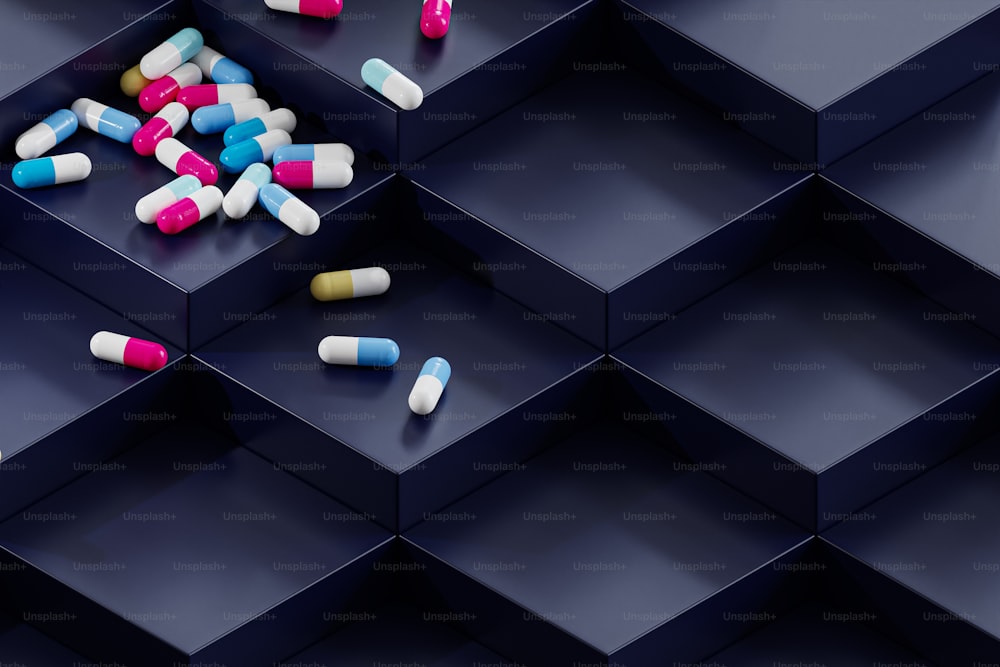 a bunch of pills sitting on top of a blue shelf