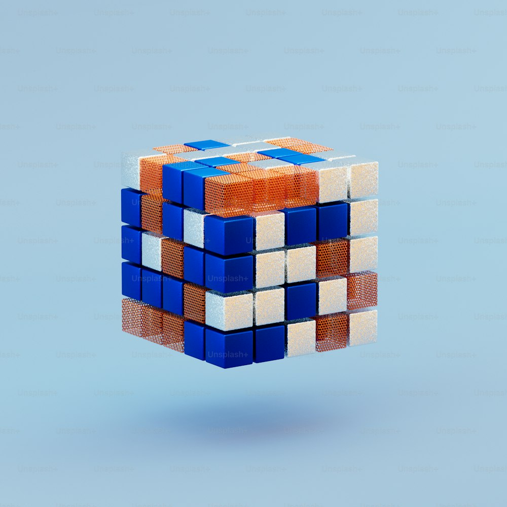 Se muestra un cubo de Rubik sobre un fondo azul