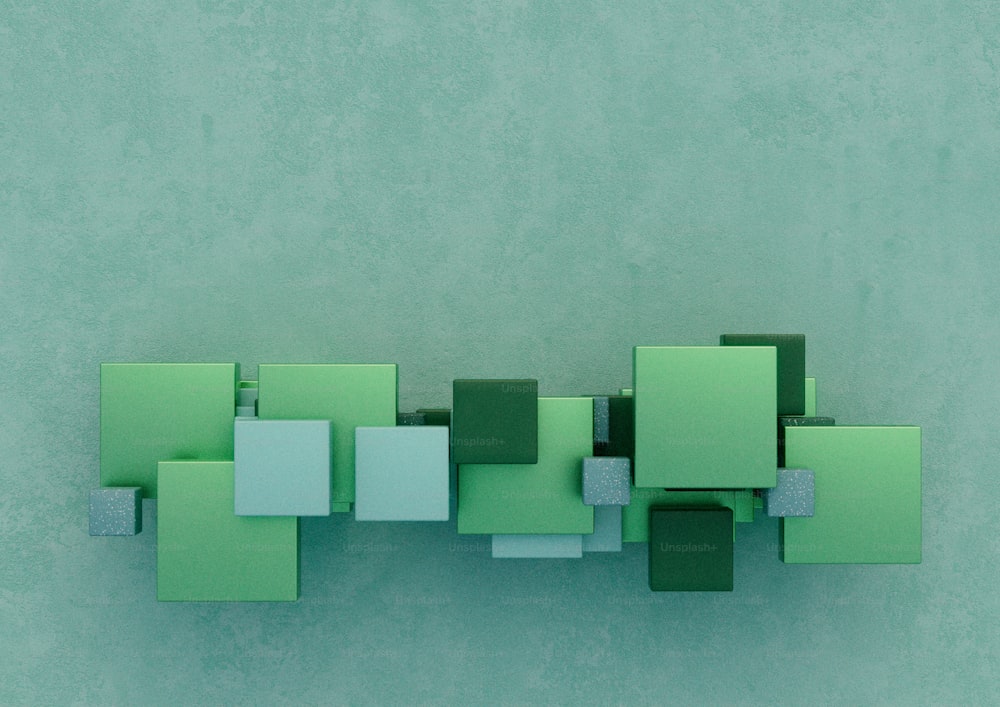 una pared verde con cuadrados y rectángulos