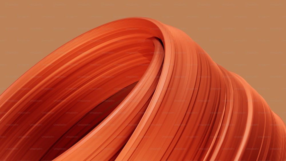 um close up de um objeto laranja com um fundo marrom