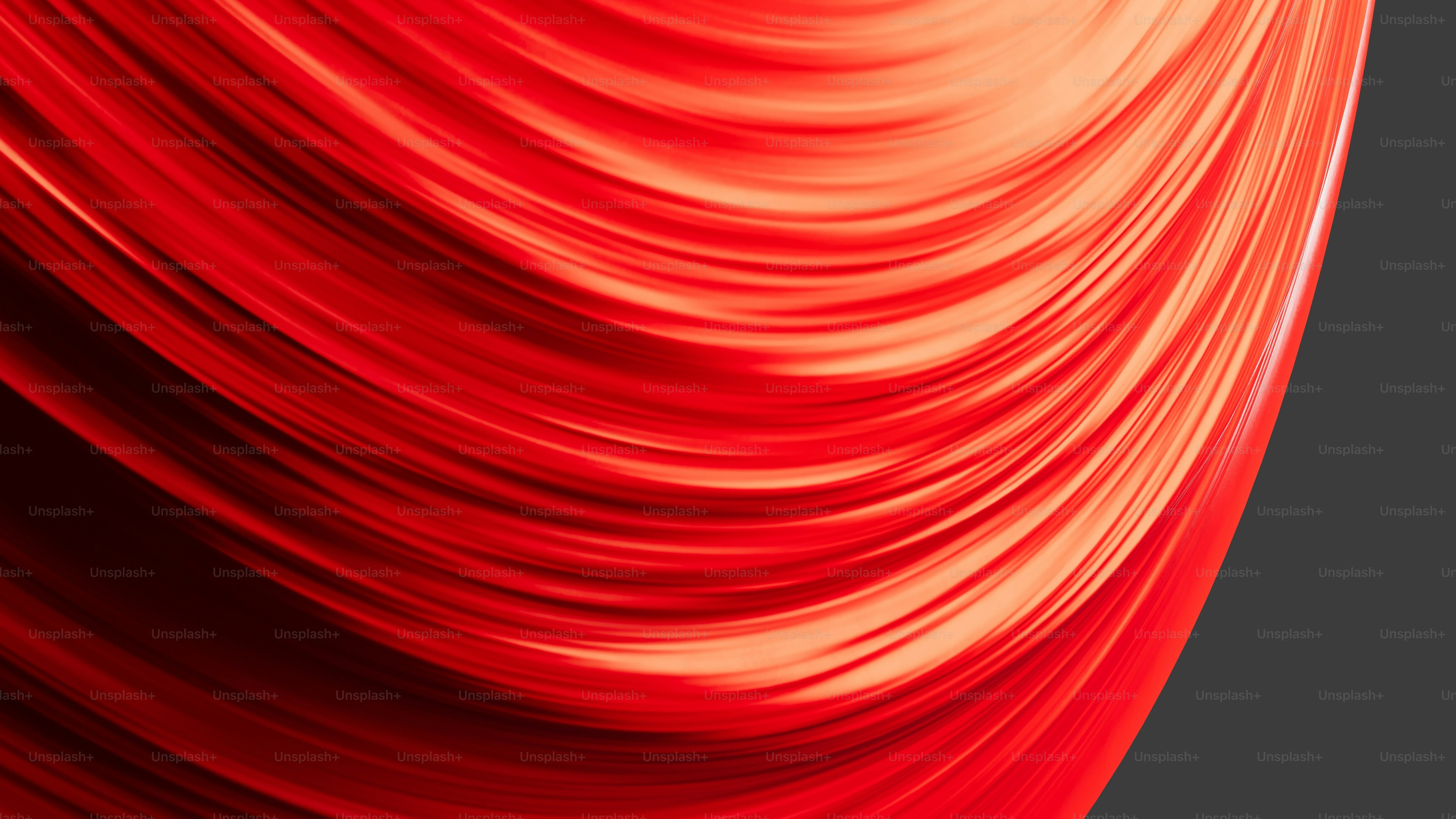 A close up of a red object on a black background photo – Wallpaper ...