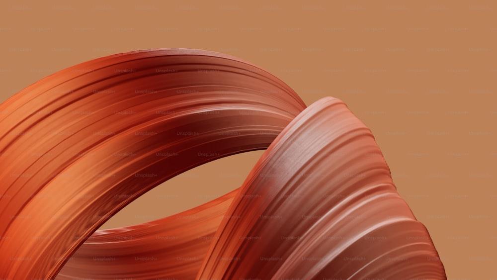 Un primer plano de un objeto rojo con un fondo marrón