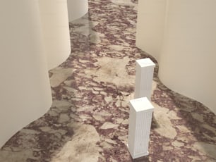 una camera con pavimenti in marmo e colonne bianche