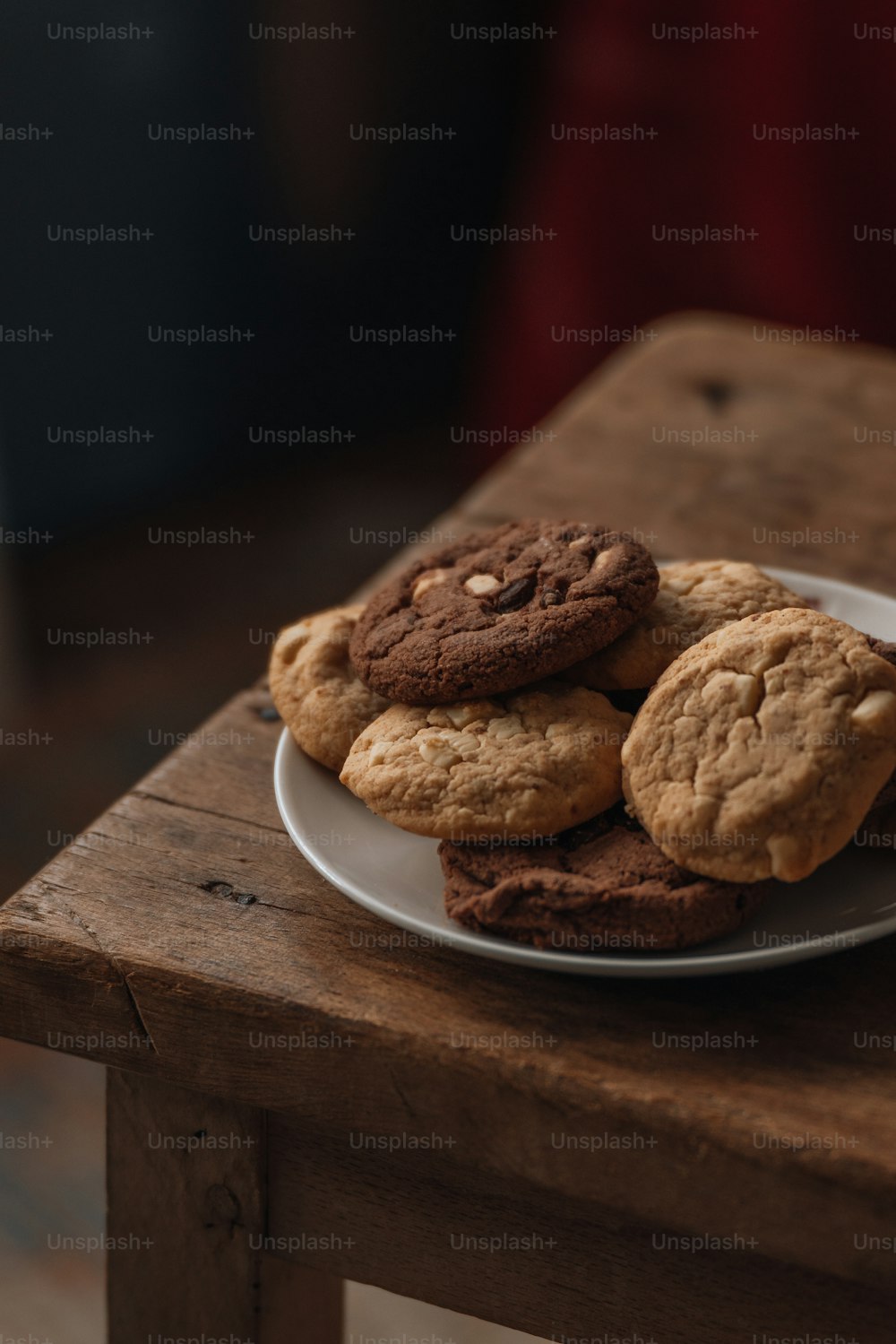 a plate of cookies on a wooden table