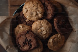 a basket full of cookies sitting on top of a table