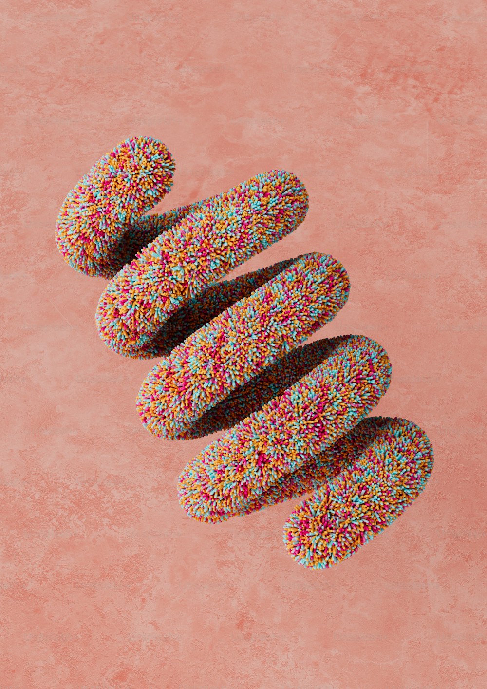 eine Gruppe von Donuts mit Streuseln auf rosa Hintergrund