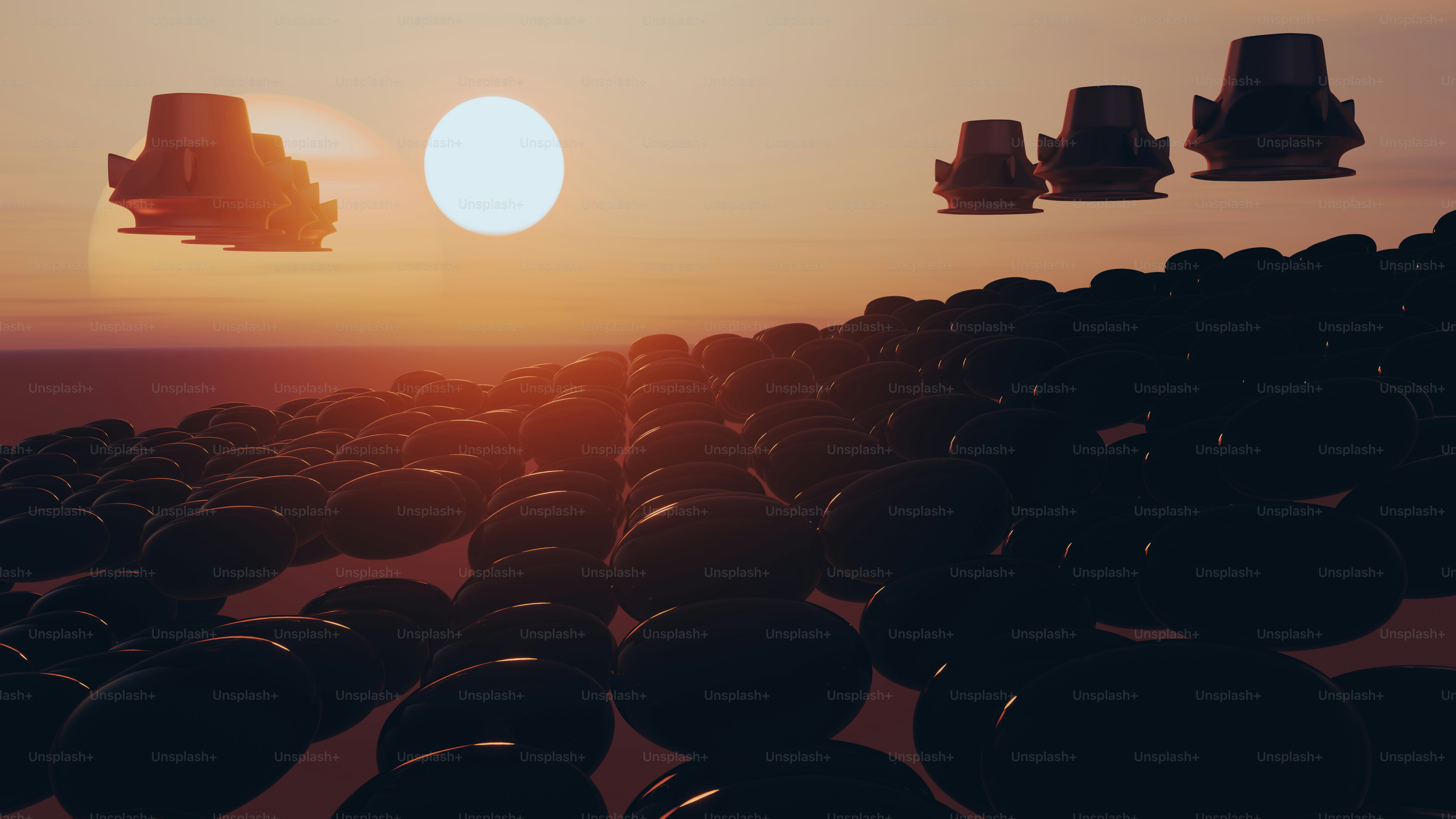 a group of objects floating in the air at sunset