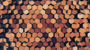 um padrão de formas hexagonais em laranja e marrom