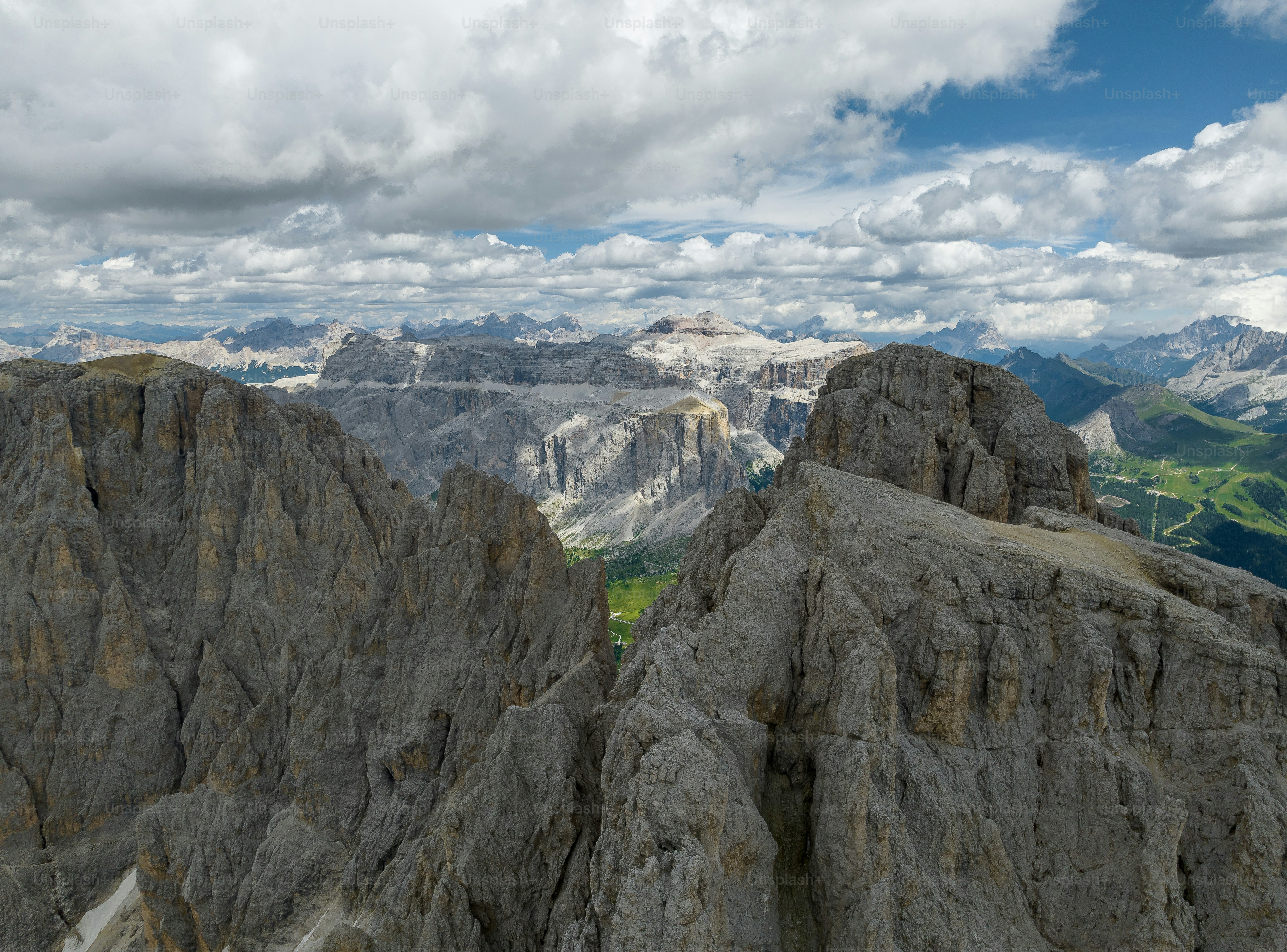 A view of a mountain range from a high point of view photo – Image on ...