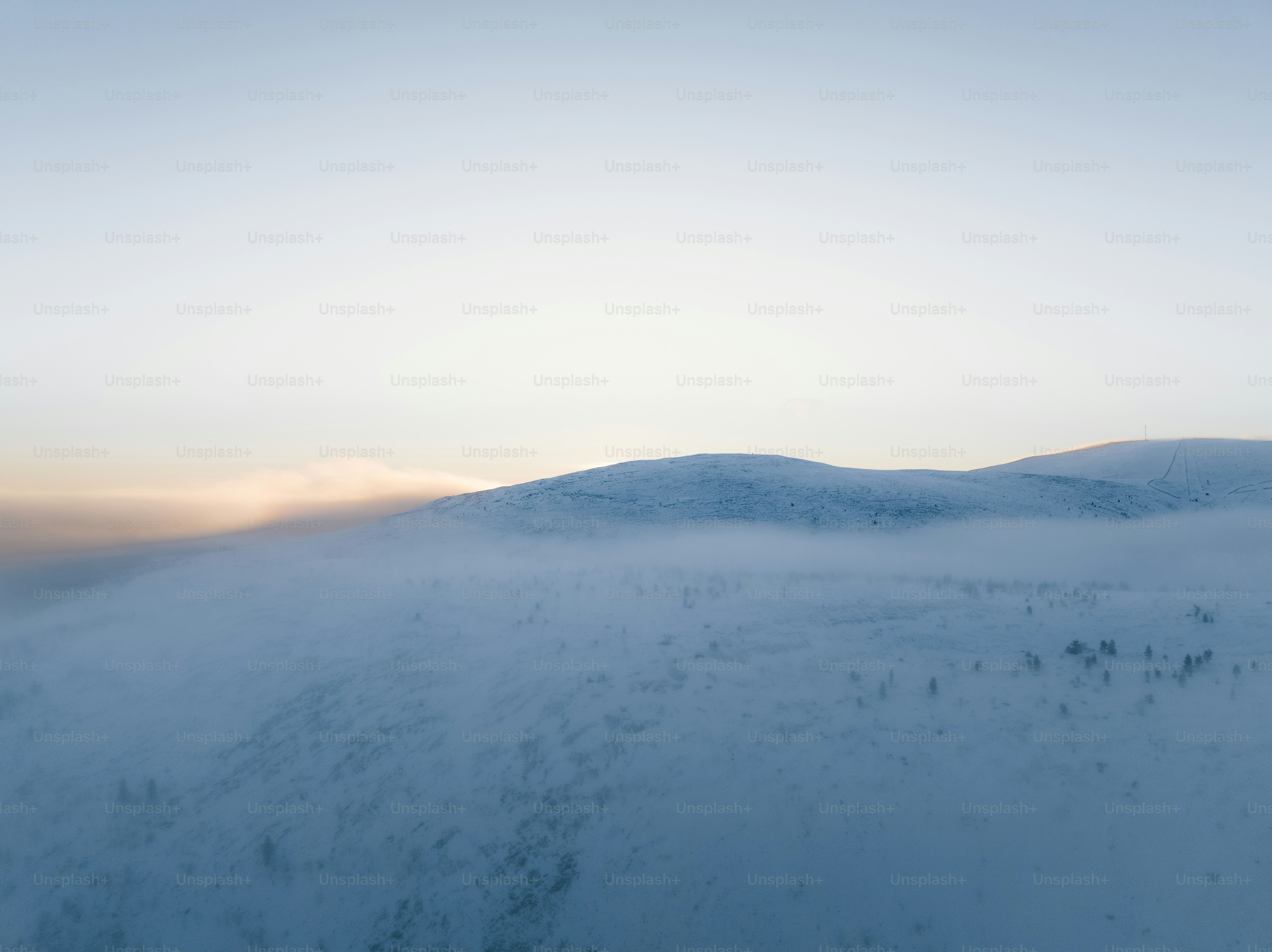 a view of a mountain covered in snow