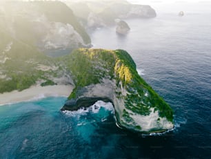 an aerial view of an island in the middle of the ocean