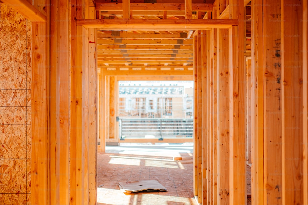 a building under construction with wooden framing