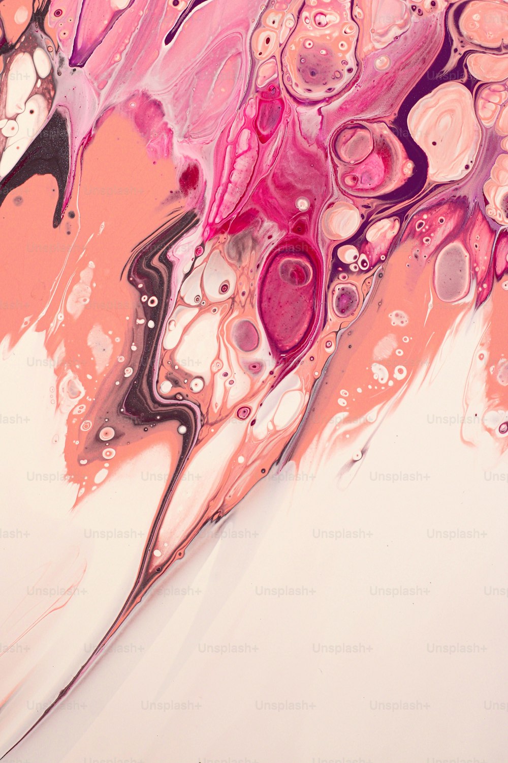 an abstract painting with pink and purple colors