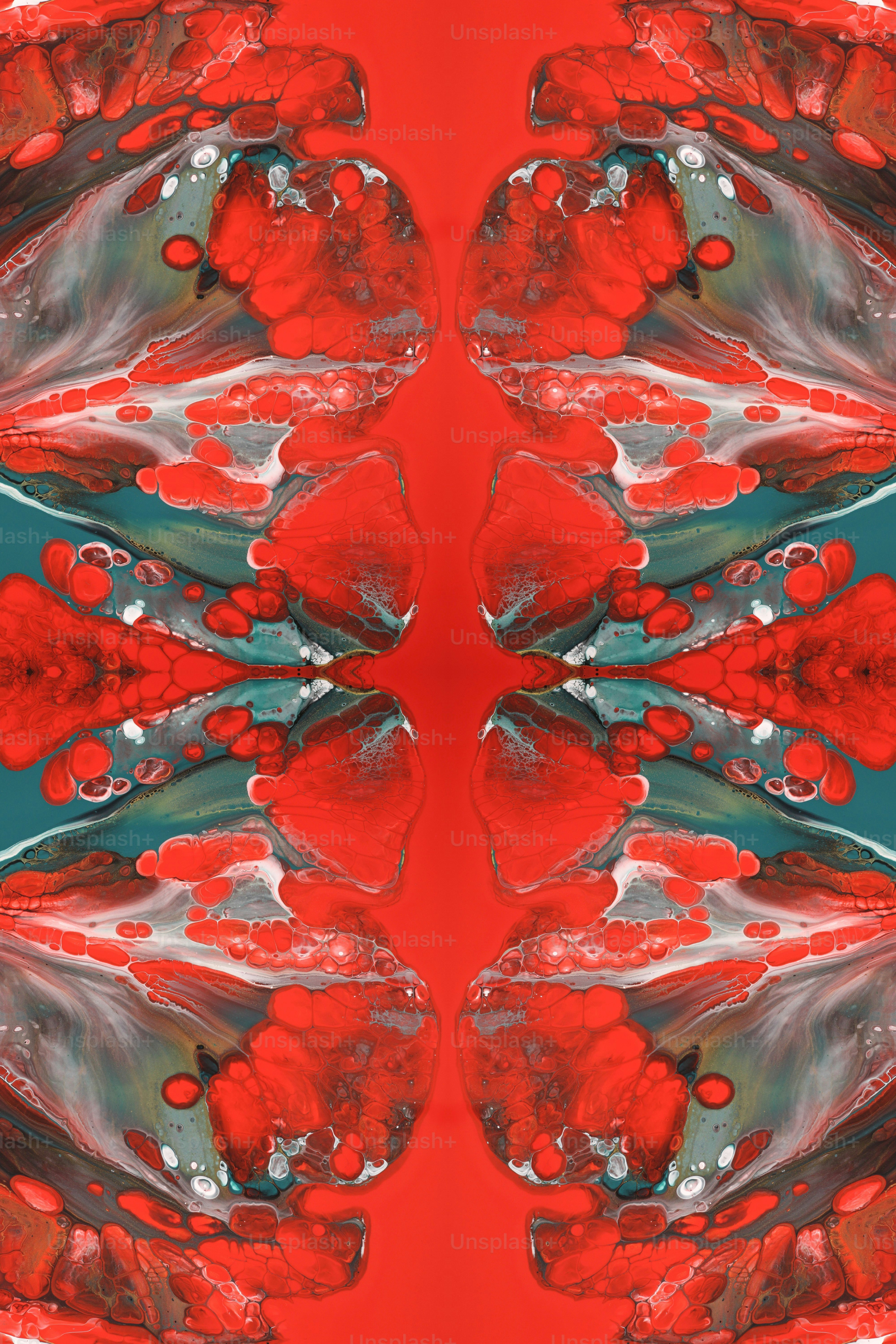 Una imagen de una flor roja y verde