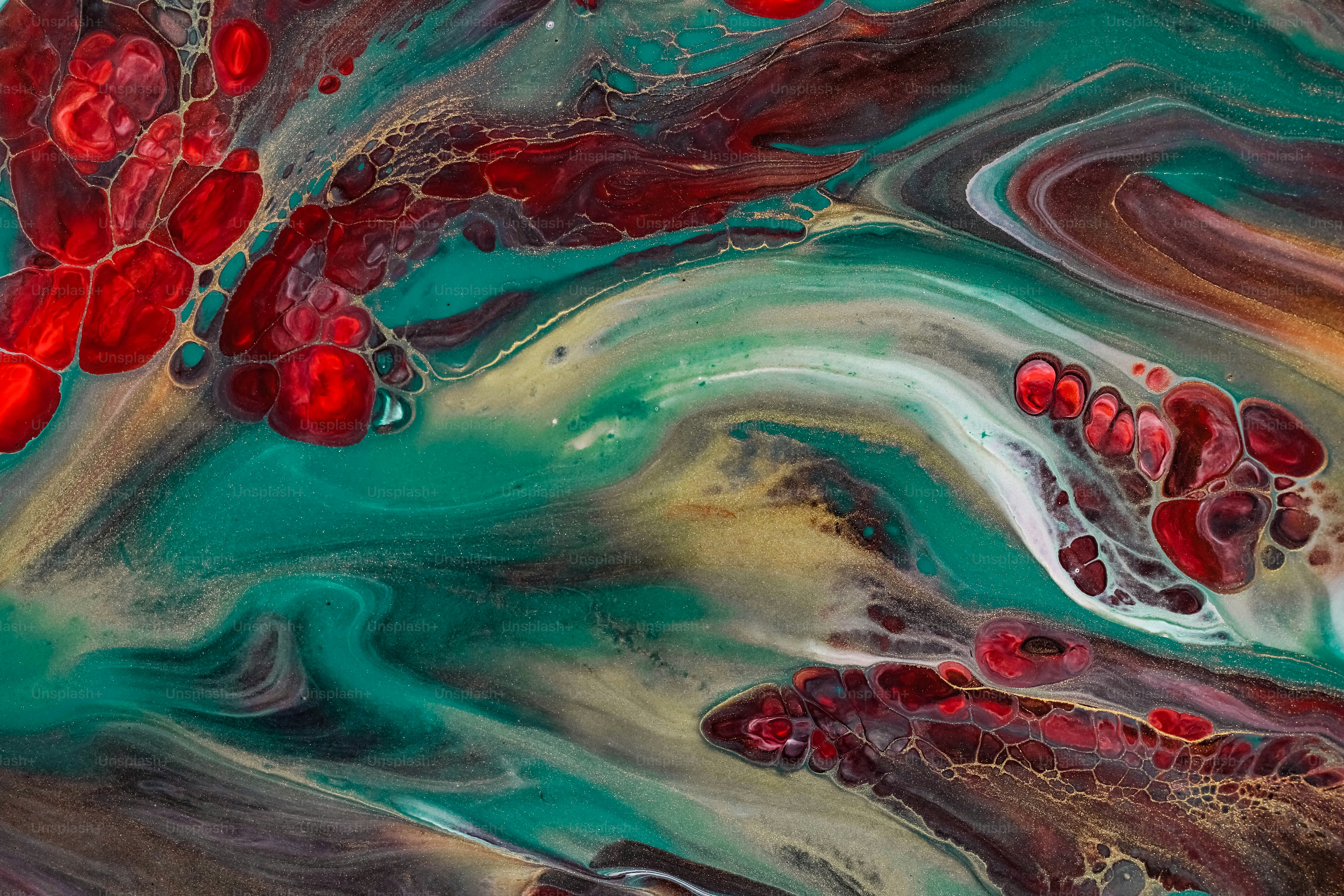 an abstract painting with red and green colors