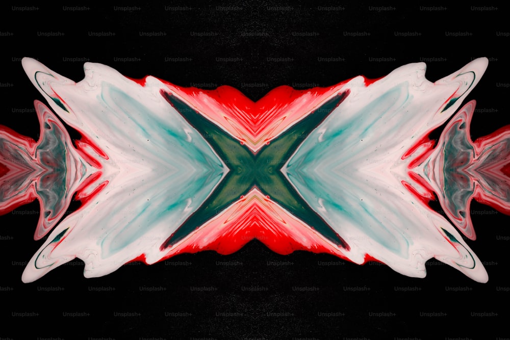 a red, white, and green abstract design on a black background