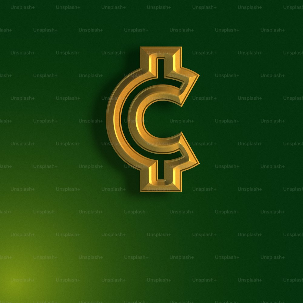緑の背景に金色の文字C