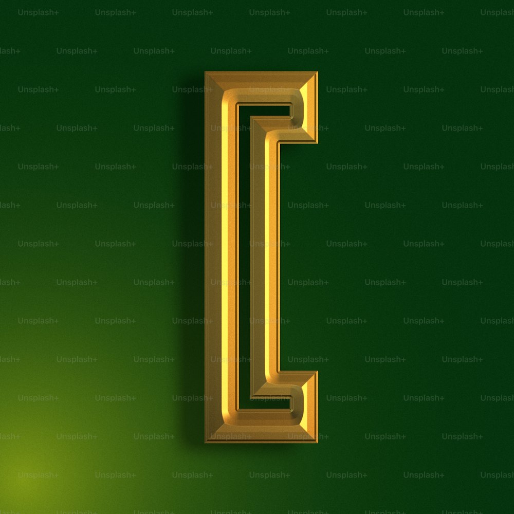 Una letra L dorada sobre un fondo verde