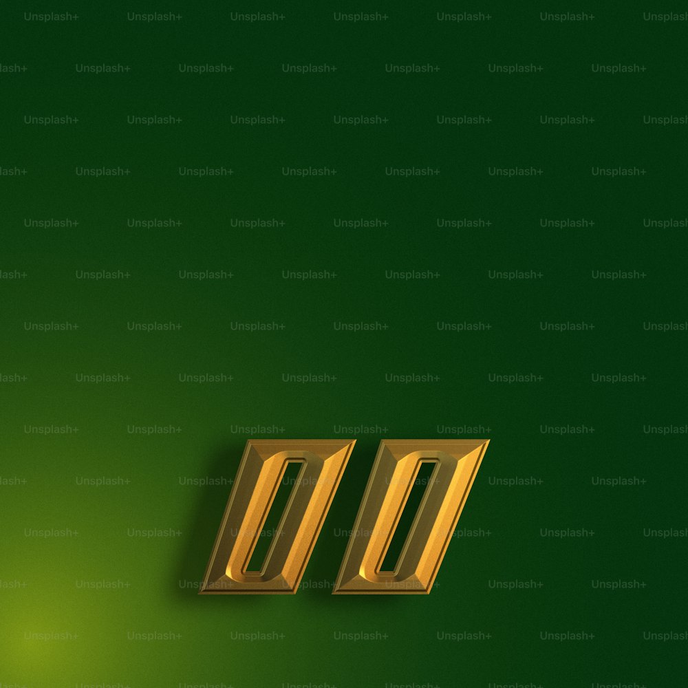 uma parede verde com dois números dourados