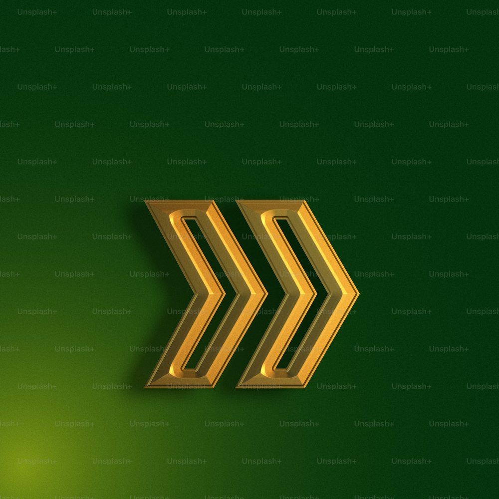 a gold arrow on a green background
