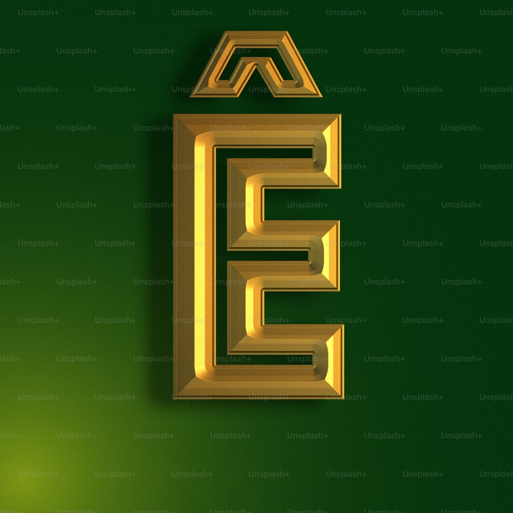 a gold letter e on a green background