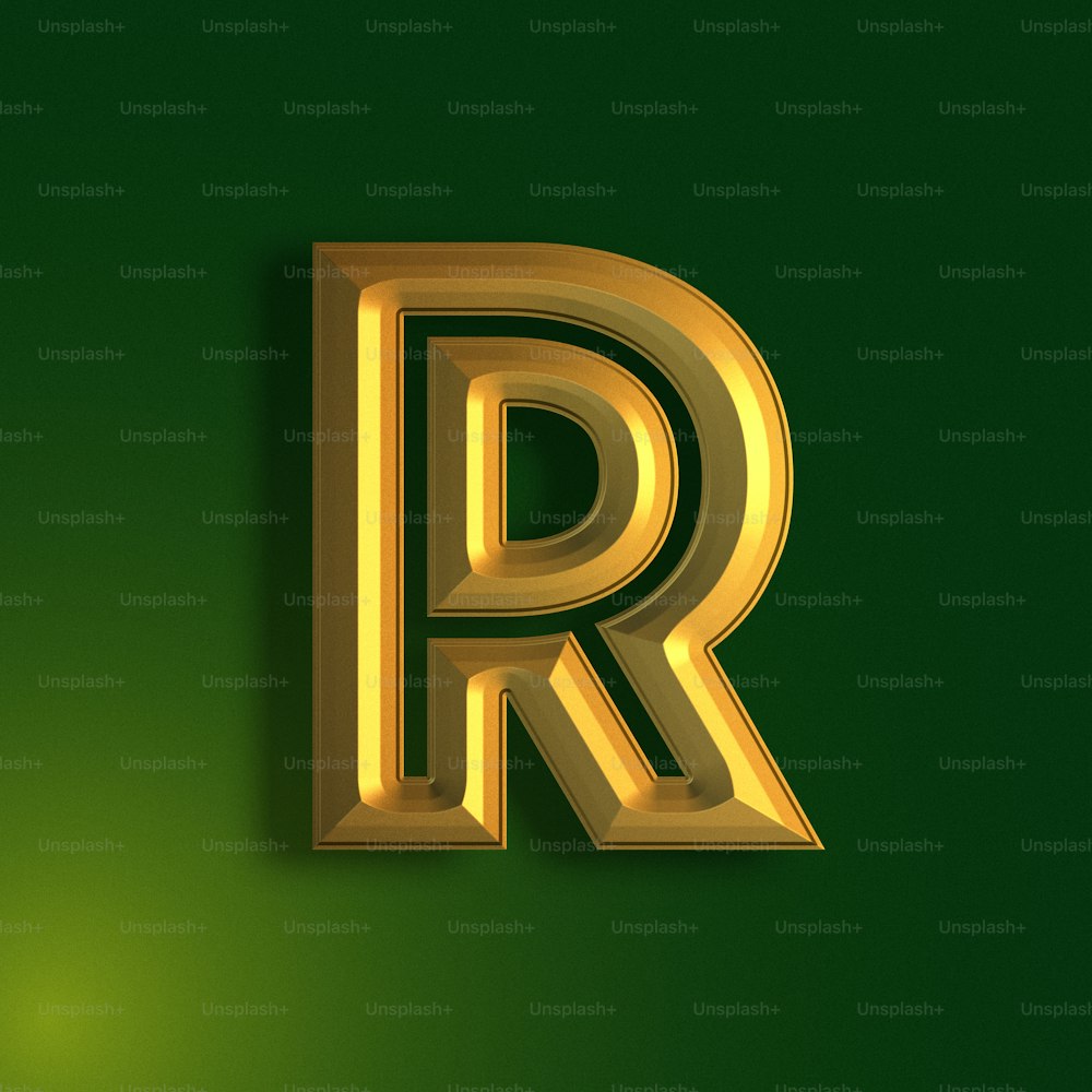 a golden letter that is on a green background