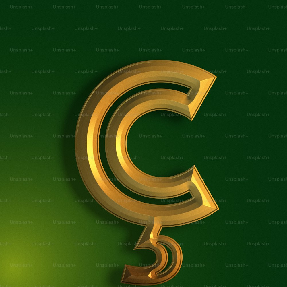 a golden letter c on a green background