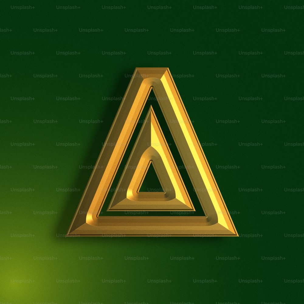 a gold triangle on a green background