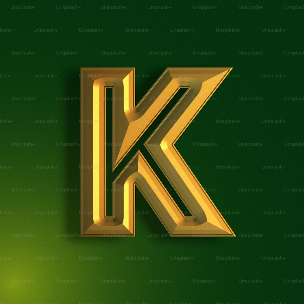 a gold letter k on a green background