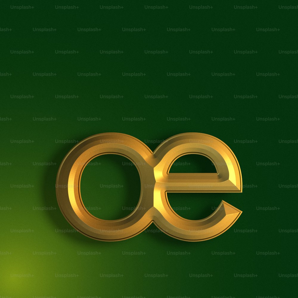 a gold letter e on a green background